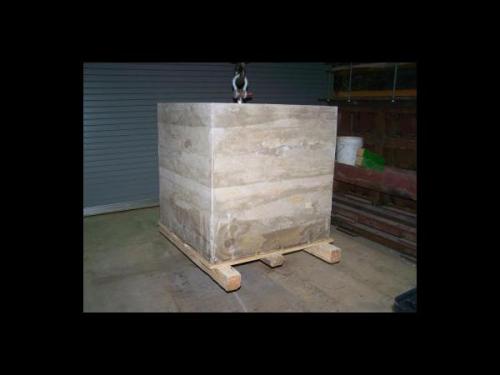 Geopolymer concrete block made with waste coal fly ash.